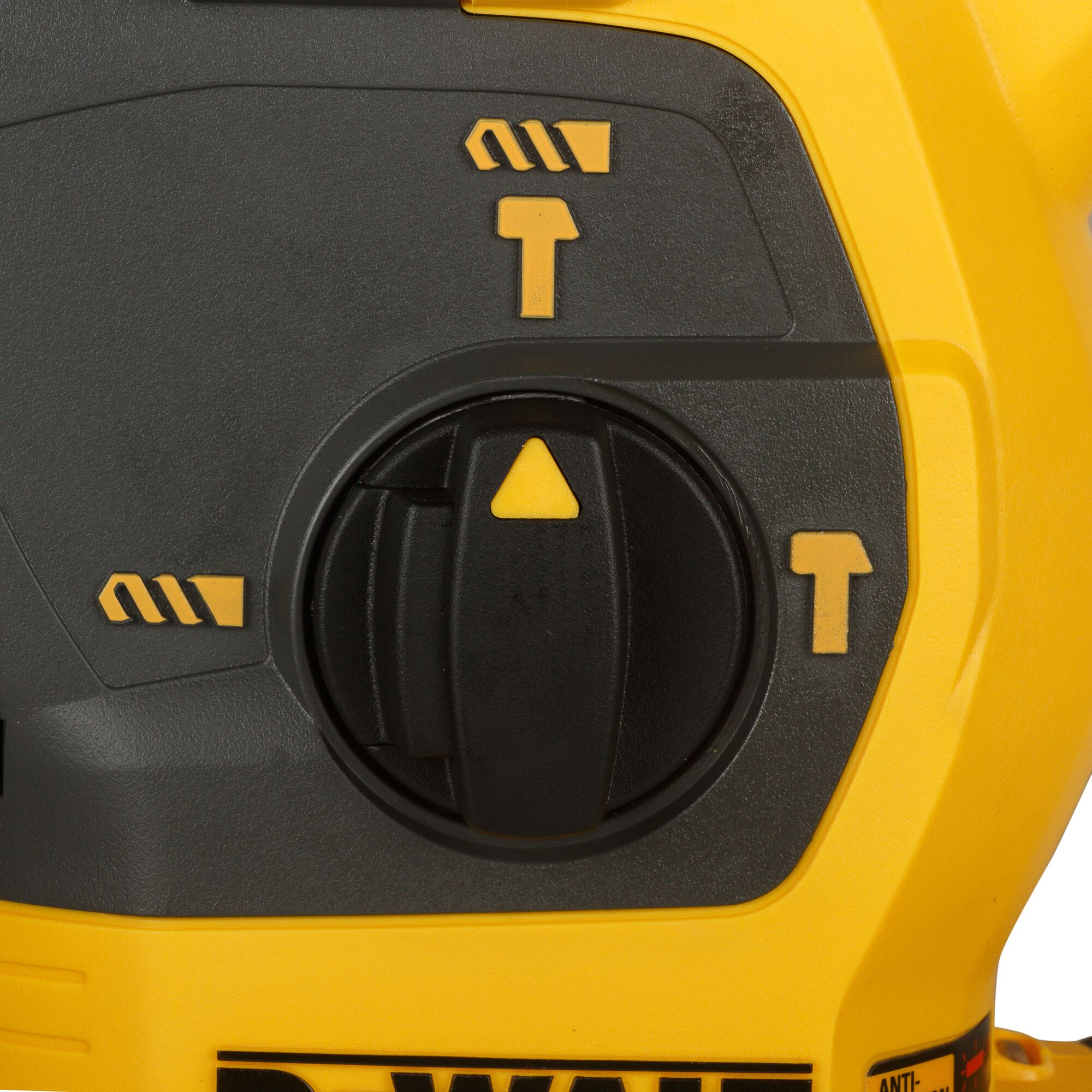Close-up of the control dial and operation mode symbols on a DEWALT power tool, featuring yellow and black colors.