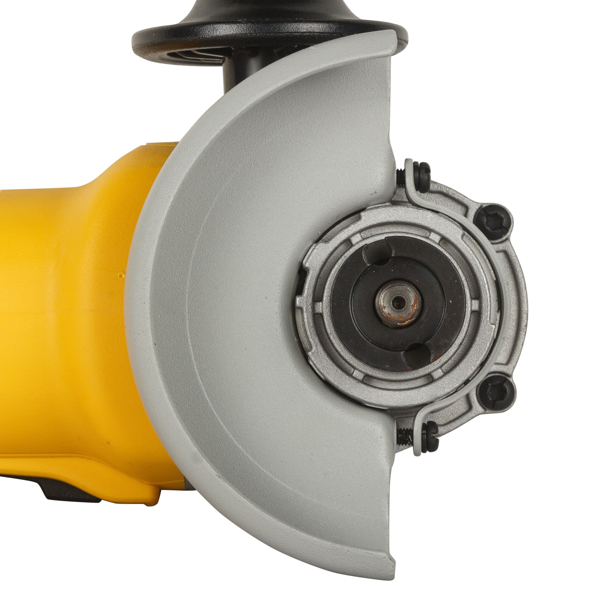 Close-up view of a DEWALT angle grinder with a yellow body and silver guard.